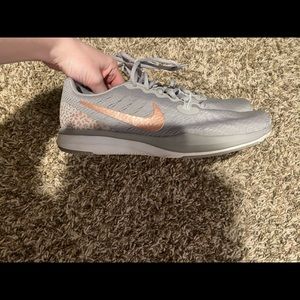 Women’s cheetah Nike tennis shoes